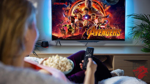 Representative shot of a movie night watching Avengers on streaming.